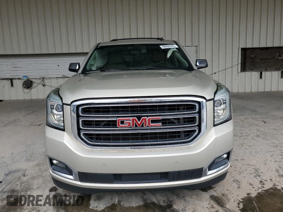 2015 GMC Yukon SLE with VIN 1GKS1AKC5FR120713, listed as a Copart auction lot 48009325 with 133,372 mi miles and Salvage Title. Bid and sale history available at carsss.com. Image 5.
