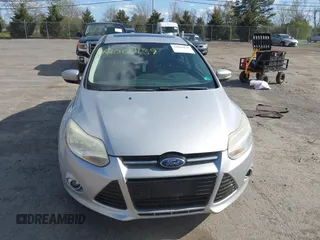 2012 Ford Focus SEL with VIN 1FAHP3H29CL151658, listed as a IAAI auction lot 42060139 with 149,547 mi miles and . Bid and sale history available at carsss.com. Image 12.