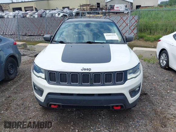 2019 Jeep Compass Trailhawk z VIN 3C4NJDDB3KT760631, wystawiony jako IAAI lot #42681139 z przebiegiem 71 128 mil mil oraz . Historia ofert i sprzedaży dostępna na DreamBid. Obrazek 12.