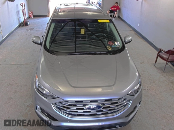 2020 Ford Edge Titanium z VIN 2FMPK4K91LBA91290, wystawiony jako IAAI lot #42494043 z przebiegiem 71 254 mil mil oraz . Historia ofert i sprzedaży dostępna na DreamBid. Obrazek 19.