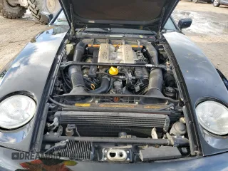 1988 Porsche 928 z VIN WP0JB0926JS861630, wystawiony jako Copart lot #73937854 z przebiegiem 112 460 mil mil oraz Nie do naprawy. Historia ofert i sprzedaży dostępna na DreamBid. Obrazek 11.