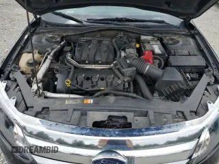 2012 Ford Fusion SEL z VIN 3FAHP0JG2CR433596, wystawiony jako Copart lot #59769105 z przebiegiem 126 230 mil mil oraz Czysty tytuł • Clean title. Historia ofert i sprzedaży dostępna na DreamBid. Obrazek 11.