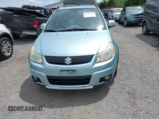 2009 Suzuki SX4 Touring AWD z VIN JS2YB417096201672, wystawiony jako IAAI lot #42209018 z przebiegiem 64 879 mil mil oraz . Historia ofert i sprzedaży dostępna na DreamBid. Obrazek 13.