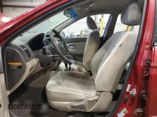 2009 Kia Spectra EX with VIN KNAFE222595647822, listed as a Copart auction lot 72515854 with 167,102 mi miles and Salvage Title. Bid and sale history available at carsss.com. Image 7.