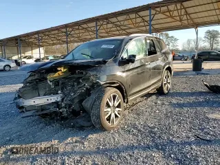2020 Honda Pilot Touring 8-Passenger with VIN 5FNYF6H96LB012456, listed as a Copart auction lot 87736855 with 43,147 mi miles and Salvage Title. Bid and sale history available at DreamBid. Image 12.