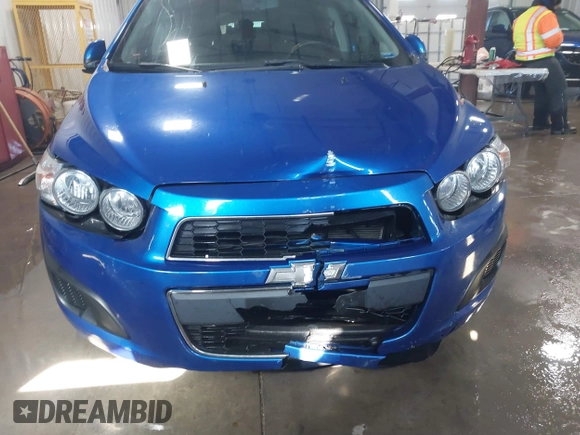 2016 Chevrolet Sonic LT with VIN 1G1JC6SH5G4163790, listed as a IAAI auction lot 41629040 with 82,381 mi miles. Bid and sale history available at carsss.com. Image 6.