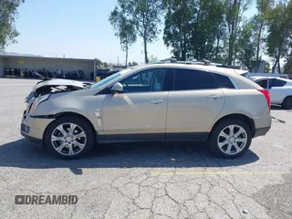 2011 Cadillac SRX Premium Collection z VIN 3GYFNCEY3BS506360, wystawiony jako IAAI lot #42096225 z przebiegiem 173 514 mil mil oraz . Historia ofert i sprzedaży dostępna na DreamBid. Obrazek 14.