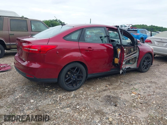 2016 Ford Focus SE with VIN 1FADP3F28GL266971, listed as a IAAI auction lot 42366561 with 67,390 mi miles and . Bid and sale history available at DreamBid. Image 4.