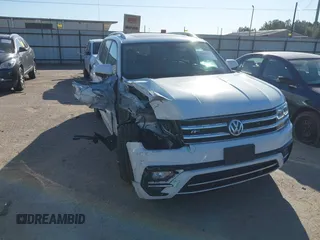 2018 Volkswagen Atlas SEL z VIN 1V2RR2CA1JC566065, wystawiony jako IAAI lot #41687434 z przebiegiem 77 795 mil mil oraz . Historia ofert i sprzedaży dostępna na DreamBid. Obrazek 1.