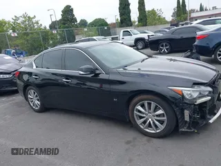 2015 Infiniti Q50 z VIN JN1BV7AP3FM336566, wystawiony jako IAAI lot #42349544 z przebiegiem 84 077 mil mil oraz . Historia ofert i sprzedaży dostępna na DreamBid. Obrazek 14.