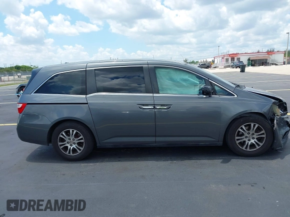 2012 Honda Odyssey EX-L с VIN 5FNRL5H69CB060174, выставлен на аукционе IAAI как лот 42335345 с пробегом 150 457 миль миль и . История ставок и продаж доступна на DreamBid. Изображение 13.