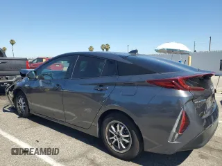 2021 Toyota Prius LE with VIN JTDKAMFP5M3177018, listed as a Copart auction lot 63930405 with 58,439 mi miles and Salvage title. Bid and sale history available at DreamBid. Image 2.