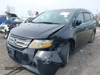 2012 Honda Odyssey EX-L with VIN 5FNRL5H63CB070361, listed as a IAAI auction lot 42025024 with 152,258 mi miles and . Bid and sale history available at carsss.com. Image 17.