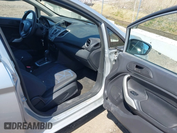 2013 Ford Fiesta SE with VIN 3FADP4EJ9DM157685, listed as a IAAI auction lot 42145511 with 101,331 mi miles. Bid and sale history available at carsss.com. Image 5.