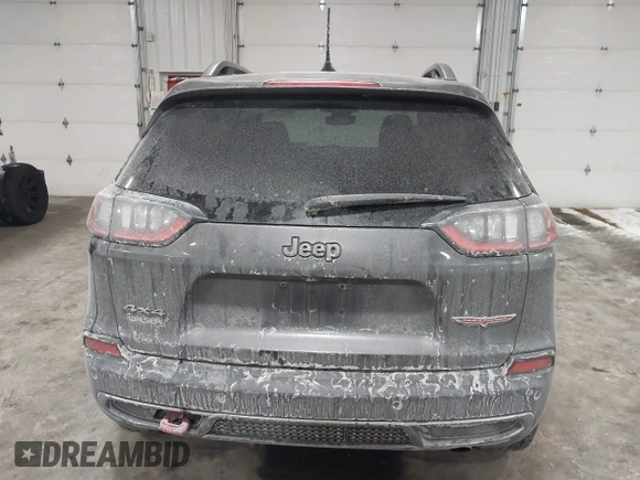 2021 Jeep Cherokee Trailhawk z VIN 1C4PJMBX4MD148597, wystawiony jako IAAI lot #41622099 z przebiegiem 48 452 mil mil oraz . Historia ofert i sprzedaży dostępna na DreamBid. Obrazek 16.
