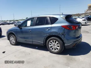 2016 Mazda CX-5 Touring with VIN JM3KE2CY3G0635643, listed as a Copart auction lot 52949105 with 179,464 mi miles and Clean Title. Bid and sale history available at carsss.com. Image 2.
