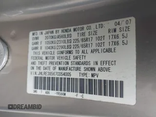 2007 Honda CR-V EX with VIN JHLRE38567C054005, listed as a IAAI auction lot 41987297 with 206,145 mi miles and . Bid and sale history available at carsss.com. Image 9.