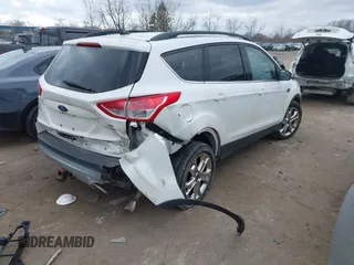 2016 Ford Escape SE with VIN 1FMCU9G94GUB55448, listed as a IAAI auction lot 41854864 with 153,457 mi miles. Bid and sale history available at carsss.com. Image 4.
