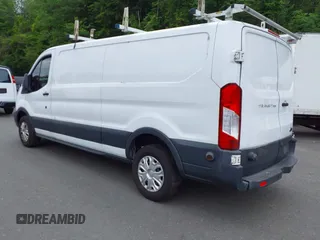 2016 Ford Transit Cargo z VIN 1FTYR2ZM6GKA03946, wystawiony jako IAAI lot #42590477 z przebiegiem 163 710 mil mil oraz . Historia ofert i sprzedaży dostępna na DreamBid. Obrazek 3.
