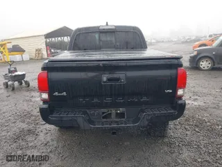 2022 Toyota Tacoma 4WD SR with VIN 3TMCZ5ANXNM490638, listed as a IAAI auction lot 41286719 with 52,328 mi miles. Bid and sale history available at carsss.com. Image 17.