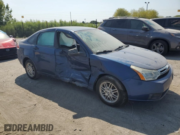 2009 Ford Focus SE with VIN 1FAHP35N69W173977, listed as a Copart auction lot 69018554 with 138,496 mi miles and Salvage Title. Bid and sale history available at DreamBid. Image 4.