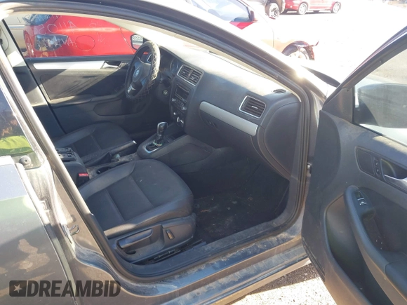 2013 Volkswagen Jetta SE with VIN 3VWDX7AJ1DM411050, listed as a IAAI auction lot 40888860 with 57,938 mi miles and . Bid and sale history available at DreamBid. Image 5.