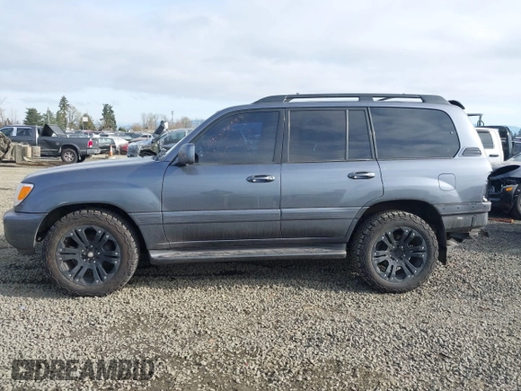 2005 Toyota Land Cruiser z VIN JTEHT05J852069392, wystawiony jako IAAI lot #41450782 z przebiegiem 187 949 mil mil oraz . Historia ofert i sprzedaży dostępna na DreamBid. Obrazek 14.