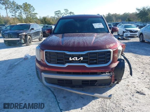 2023 Kia Telluride S with VIN 5XYP64GC4PG365452, listed as a IAAI auction lot 41772899 with 51,599 mi miles and . Bid and sale history available at DreamBid. Image 12.