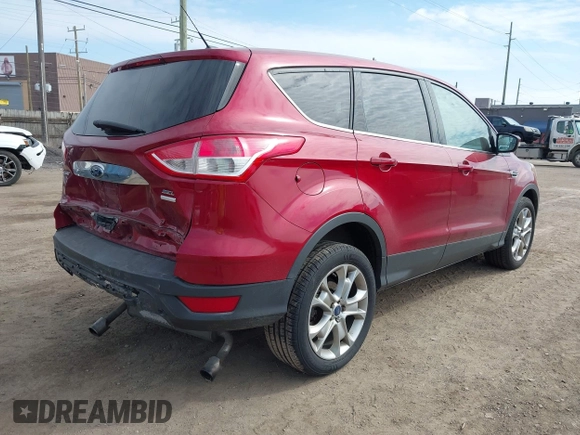 2013 Ford Escape SEL with VIN 1FMCU9H9XDUA81463, listed as a IAAI auction lot 41991257 with 102,867 mi miles and . Bid and sale history available at DreamBid. Image 4.