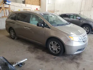 2011 Honda Odyssey EX-L with VIN 5FNRL5H63BB077325, listed as a Copart auction lot 55030675 with 203,062 mi miles and Salvage Title. Bid and sale history available at DreamBid. Image 4.