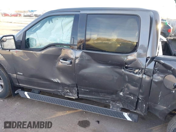 2015 Ford F-150 XLT with VIN 1FTEW1EP1FKE16670, listed as a IAAI auction lot 41120641 with 102,770 mi miles. Bid and sale history available at carsss.com. Image 6.