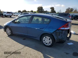 2013 Honda Insight with VIN JHMZE2H3XDS005377, listed as a Copart auction lot 50602815 with 112,177 mi miles and Salvage title. Bid and sale history available at DreamBid. Image 2.