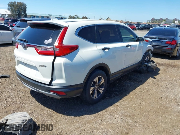 2017 Honda CR-V LX with VIN 2HKRW6H34HH219033, listed as a IAAI auction lot 41948876 with 105,813 mi miles. Bid and sale history available at carsss.com. Image 4.