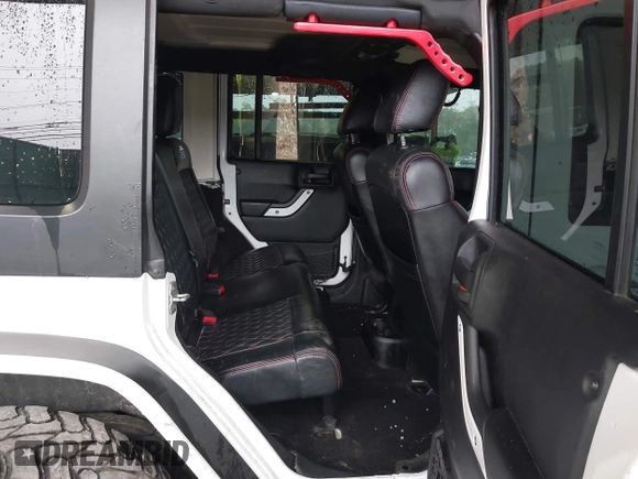 2012 Jeep Wrangler Unlimited Sport с VIN 1C4BJWDG8CL183831, выставлен на аукционе IAAI как лот 42343612 с пробегом 166 847 миль миль и . История ставок и продаж доступна на DreamBid. Изображение 8.