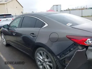 2016 Mazda 6 i Touring with VIN JM1GJ1V52G1473330, listed as a IAAI auction lot 41657684 with 138,064 mi miles and . Bid and sale history available at DreamBid. Image 14.