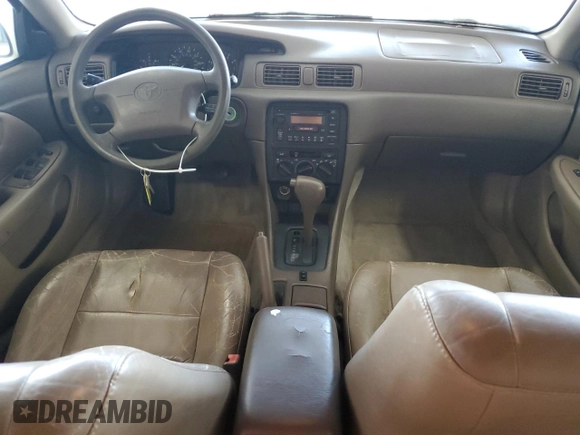 1999 Toyota Camry LE с VIN JT2BG22K3X0317823, выставлен на аукционе Copart как лот 58203965 с пробегом 167 587 миль миль и Списание • Salvage title. История ставок и продаж доступна на DreamBid. Изображение 8.