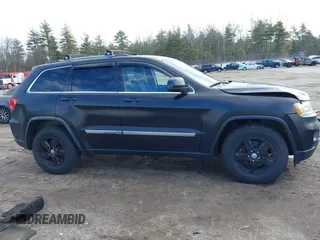 2011 Jeep Grand Cherokee Laredo with VIN 1J4RR4GG5BC670369, listed as a IAAI auction lot 41892892 with 164,807 mi miles and . Bid and sale history available at DreamBid. Image 13.