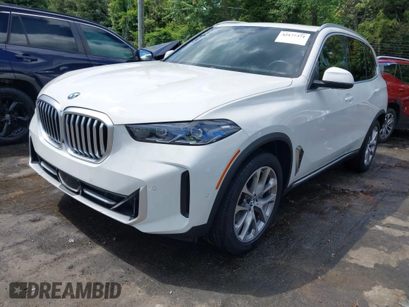 2024 BMW X5 xDrive40i z VIN 5UX23EU05R9S29952, wystawiony jako IAAI lot #42177371 z przebiegiem 26 832 mil mil oraz . Historia ofert i sprzedaży dostępna na DreamBid. Obrazek 17.