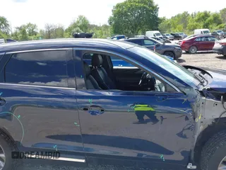 2021 Mazda CX-9 Grand Touring with VIN JM3TCBDY4M0513099, listed as a IAAI auction lot 42563530 with 76,006 mi miles and . Bid and sale history available at DreamBid. Image 14.