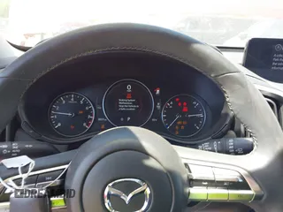 2024 Mazda CX-50 S Select with VIN 7MMVABAM4RN242452, listed as a IAAI auction lot 42027929 with 8,931 mi miles and . Bid and sale history available at DreamBid. Image 7.