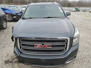 2020 GMC Yukon SLT with VIN 1GKS1BKC3LR259725, listed as a Copart auction lot 43036055 with 125,347 mi miles and Salvage Title. Bid and sale history available at DreamBid. Image 5.