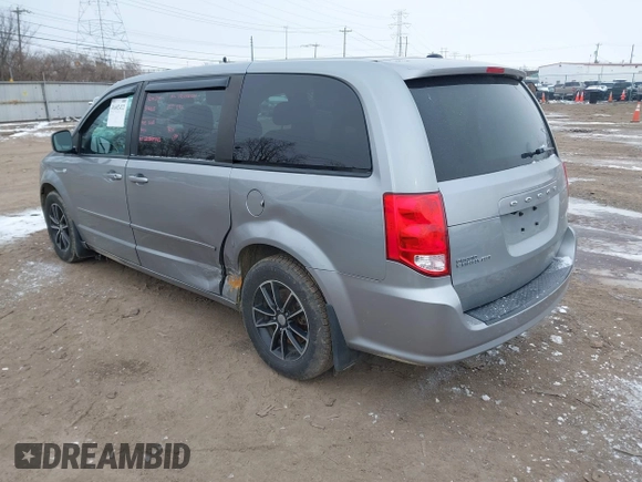 2014 Dodge Grand Caravan SXT with VIN 2C4RDGCGXER308657, listed as a IAAI auction lot 41602422 with 200,643 mi miles and . Bid and sale history available at DreamBid. Image 3.