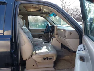 2002 Chevrolet Suburban Z71 with VIN 3GNFK16Z42G199561, listed as a IAAI auction lot 41442707 with 229,823 mi miles. Bid and sale history available at carsss.com. Image 5.