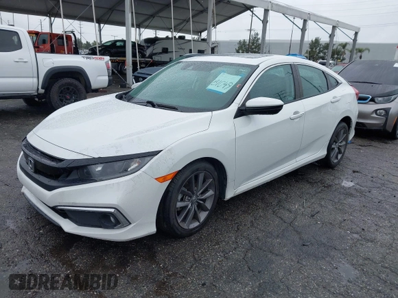2021 Honda Civic Sedan EX-L with VIN 19XFC1F77ME205128, listed as a IAAI auction lot 41562202 with 82,257 mi miles. Bid and sale history available at carsss.com. Image 17.