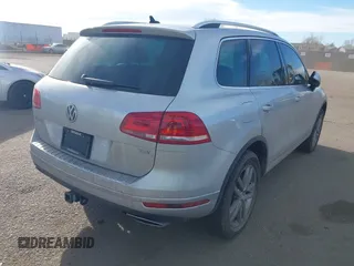 2015 Volkswagen Touareg Lux с VIN WVGEP9BP2FD001793, выставлен на аукционе IAAI как лот 41495609 с пробегом 138 239 миль миль и . История ставок и продаж доступна на DreamBid. Изображение 4.