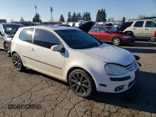 2009 Volkswagen Rabbit S with VIN WVWBB71KX9W020617, listed as a Copart auction lot 82935024 with 133,760 mi miles and Salvage Title. Bid and sale history available at carsss.com. Image 4.
