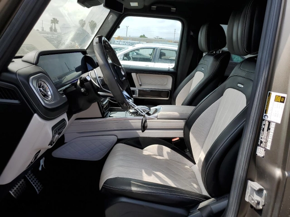 2021 Mercedes-Benz G 63 AMG with VIN W1NYC7HJ8MX392764, listed as a Copart auction lot 55893784 with 33,008 mi miles and . Bid and sale history available at DreamBid. Image 7.