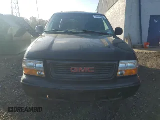 1998 GMC Jimmy SLE with VIN 1GKDT13W6W2543854, listed as a Copart auction lot 76004664 with 157,457 mi miles and Salvage Title. Bid and sale history available at carsss.com. Image 5.