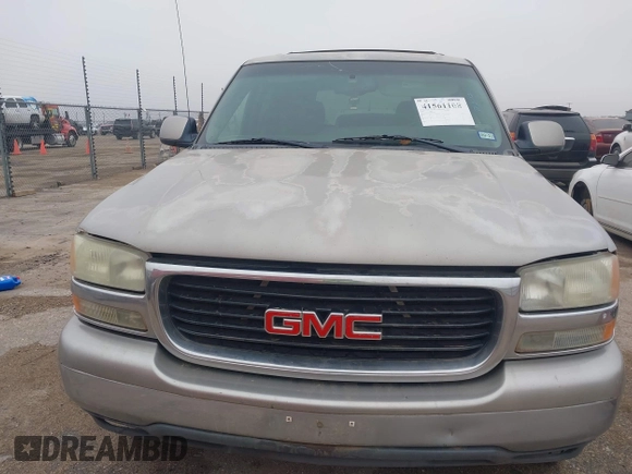 2003 GMC Yukon SLT with VIN 1GKEC13V33J287668, listed as a IAAI auction lot 41561108 with 326,719 mi miles. Bid and sale history available at carsss.com. Image 6.