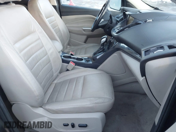 2015 Ford Escape Titanium with VIN 1FMCU0J92FUB74972, listed as a IAAI auction lot 41164519 with 228,785 mi miles and . Bid and sale history available at DreamBid. Image 5.